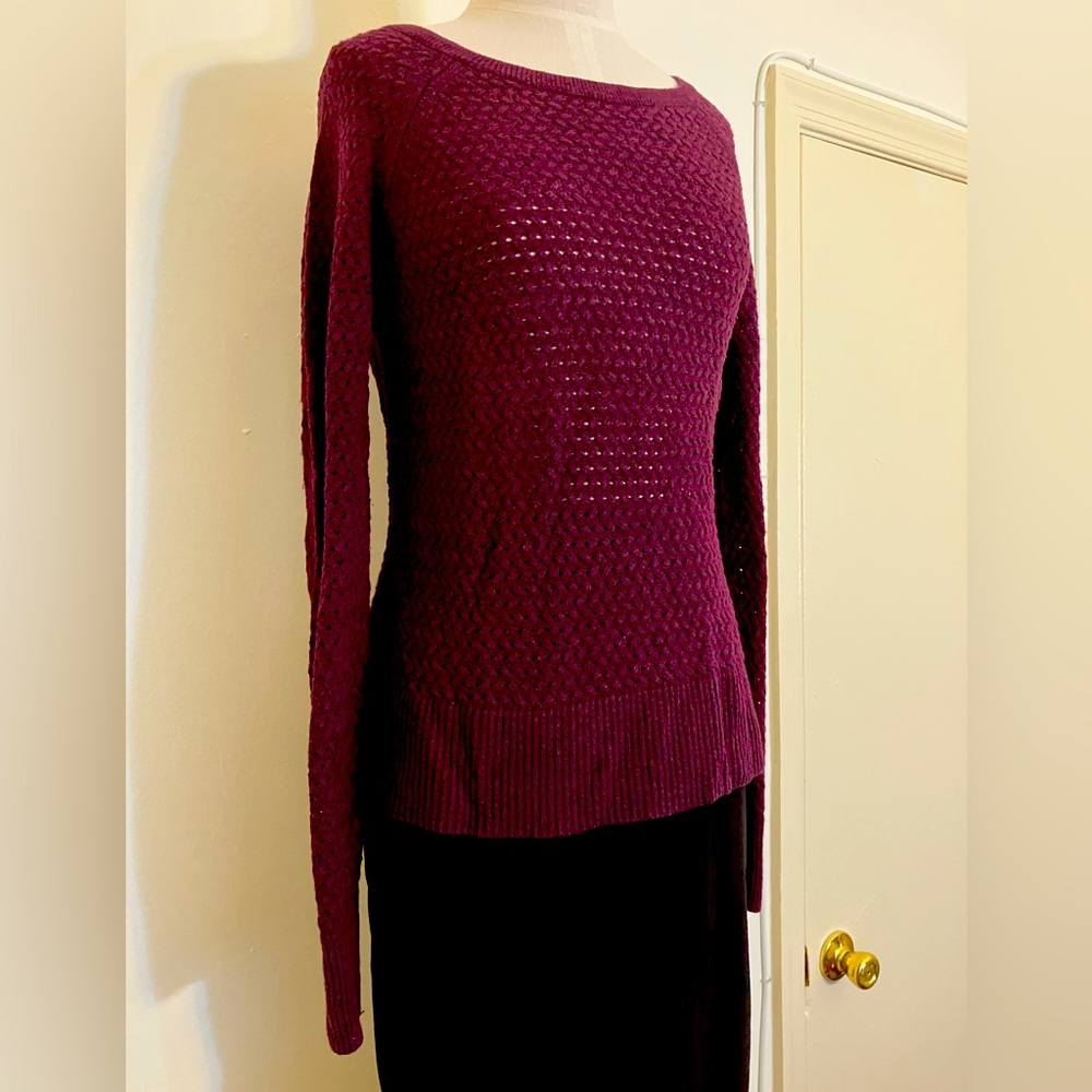 American Eagle women’s size small sweater with zip decoration on back/neck.